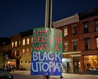Cartello "Black Utopia" a Bed-Stuy.