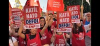 "Nato assassina vattene"