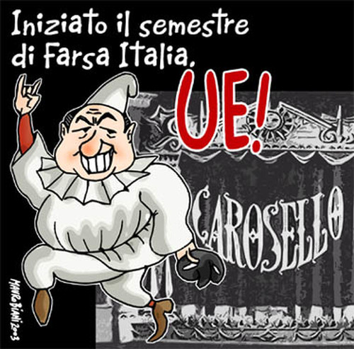 Ue!... Italiani: sole, spaghetti, mandolino e berlusconi Vignetta di Mauro Biani